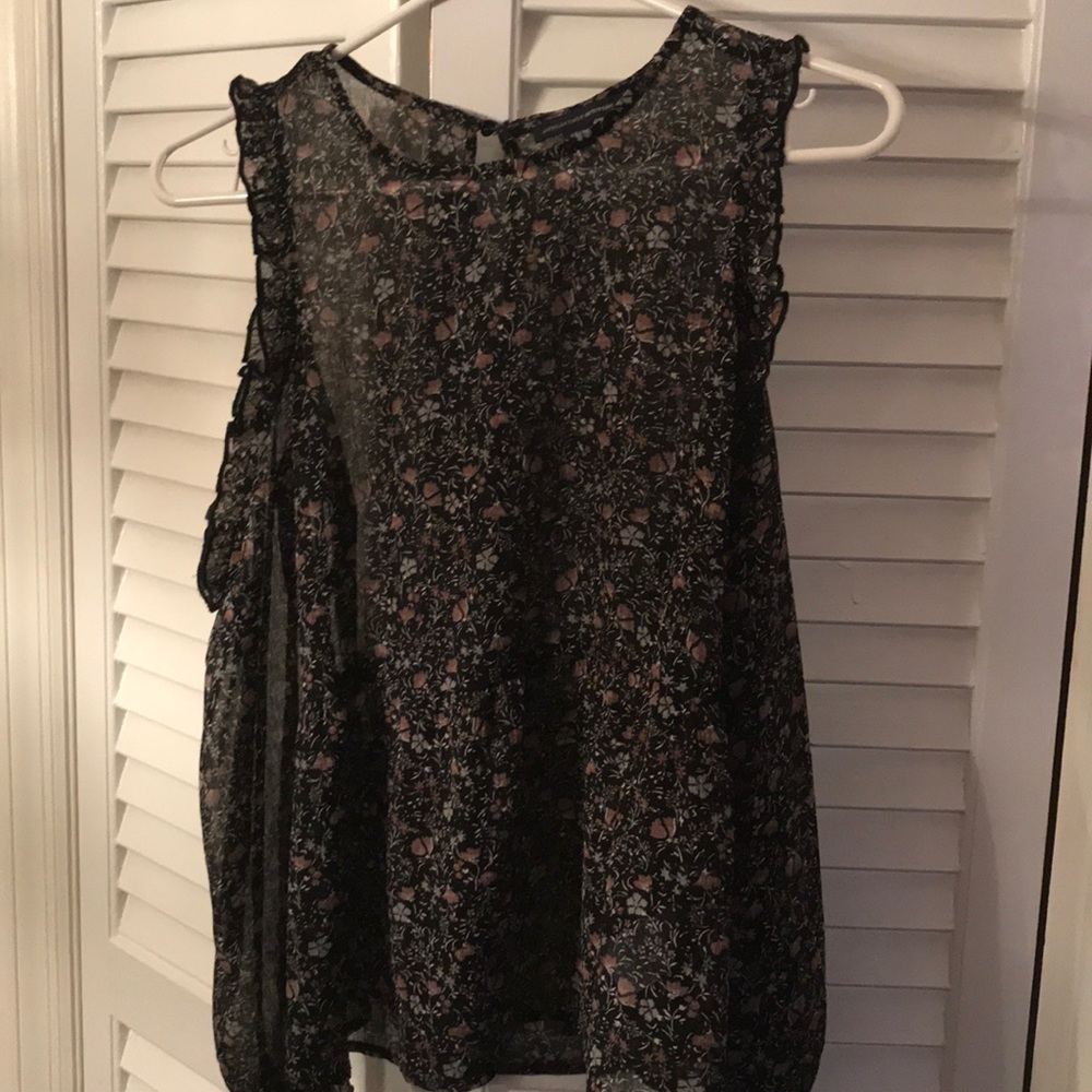 Sheer cold shoulder blouse.